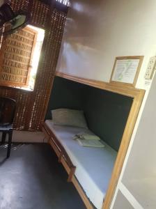Postel nebo postele na pokoji v ubytování Bongo Bongo Divers