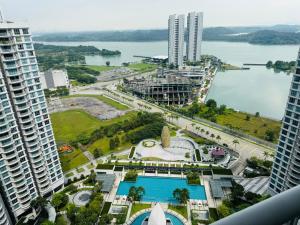 an aerial view of a city and a body of water at Teega Suites Puteri Harbour #Seaview Unit in Nusajaya