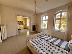 Ένα ή περισσότερα κρεβάτια σε δωμάτιο στο Beautiful apartment in a historic villa