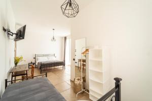 Postel nebo postele na pokoji v ubytování Casa Schiavoni