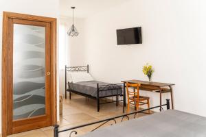 Postel nebo postele na pokoji v ubytování Casa Schiavoni