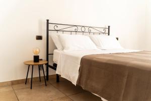 Postel nebo postele na pokoji v ubytování Casa Schiavoni + 21 fotografií