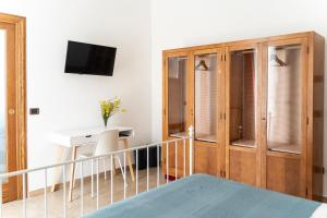Postel nebo postele na pokoji v ubytování Casa Schiavoni
