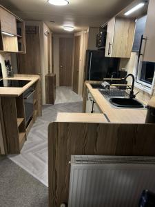 Φωτογραφία από το άλμπουμ του Primrose Valley - 25A Pine Ridge σε Filey