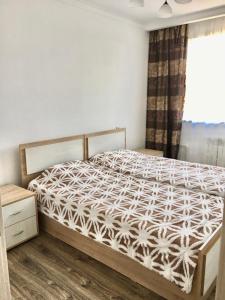 Postel nebo postele na pokoji v ubytování Дом в Боровом + 6 fotografií