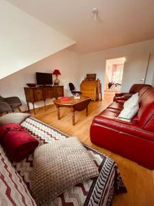 Posezení v ubytování Appartement 200m de la plage + 12 fotografií