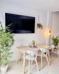 TV a/nebo společenská místnost v ubytování Adosadito Playa Oliva