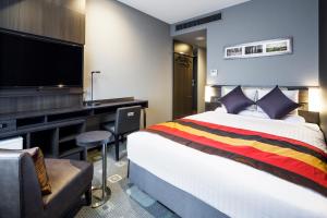 Postel nebo postele na pokoji v ubytování Hotel Mystays Premier Akasaka