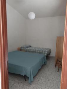 Postel nebo postele na pokoji v ubytování Villa Bianca