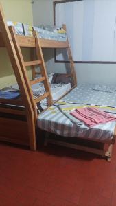 Una cama o camas en una habitación de Villa Morra house III