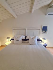 Postel nebo postele na pokoji v ubytování La Casa del Moro Pachino