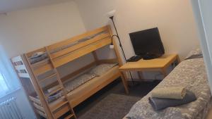 Postel nebo postele na pokoji v ubytování Family Appartment
