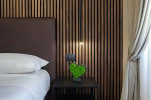 Uma cama ou camas num quarto em Hotel Paba