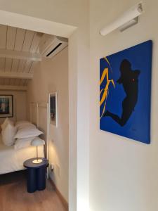 Postel nebo postele na pokoji v ubytování La Casa del Moro Pachino + 15 fotografií