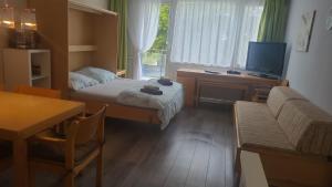 Postel nebo postele na pokoji v ubytování Family Appartment