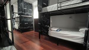 Postel nebo postele na pokoji v ubytování Chalok Hostel