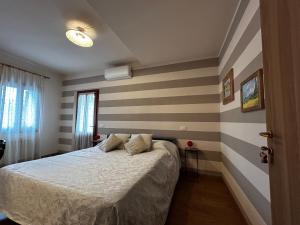 Postel nebo postele na pokoji v ubytování B&B Casa del Conte