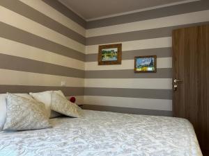 Postel nebo postele na pokoji v ubytování B&B Casa del Conte