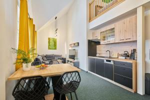 A kitchen or kitchenette at Apartmán - Dovolená Mladé Buky