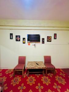 TV a/nebo společenská místnost v ubytování Violet Residency Ooty