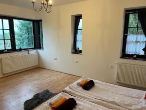 Postel nebo postele na pokoji v ubytování Lakner Lovarda + 12 fotografií