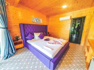 Postel nebo postele na pokoji v ubytování Moly Resort