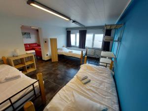 Ένα ή περισσότερα κρεβάτια σε δωμάτιο στο Mathilda - apartments