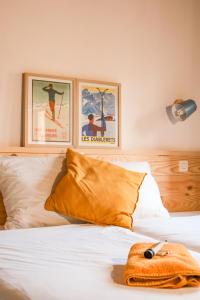 Ένα ή περισσότερα κρεβάτια σε δωμάτιο στο Hotel Le Pied Moutet
