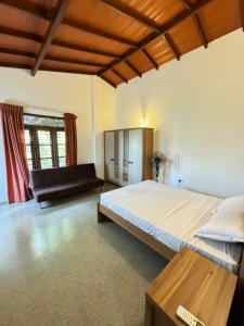 Ένα ή περισσότερα κρεβάτια σε δωμάτιο στο SOHA Residency