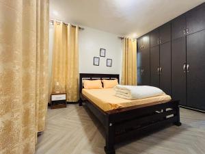 Katil atau katil-katil dalam bilik di Marjorie's Nest