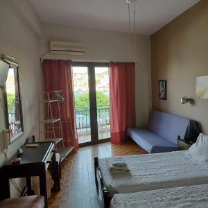 Postel nebo postele na pokoji v ubytování Bissias Guest House