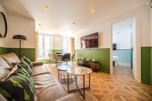 Uma área de estar em Cosy flats- NOTRE DAME