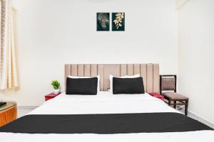 Voodi või voodid majutusasutuse Hotel O YATRA INN toas