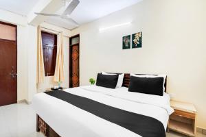 Voodi või voodid majutusasutuse Hotel O YATRA INN toas