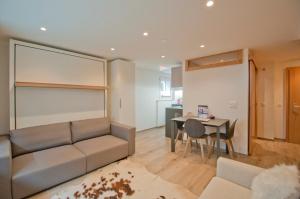 Posezení v ubytování Studio Aosta + 9 fotografií