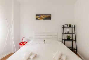 Posteľ alebo postele v izbe v ubytovaní Perla Lagunillas Málaga