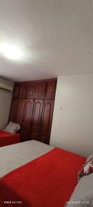 Postel nebo postele na pokoji v ubytování Villa sonhos + 4 fotografie