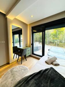 Postel nebo postele na pokoji v ubytování Brezovica Lux