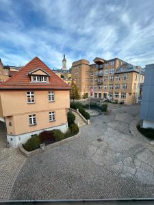 an aerial view of a building in a city at Stadtflair am Portikus in Lichtenstein-Callnberg