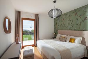 Postel nebo postele na pokoji v ubytování Portopiccolo Apartments