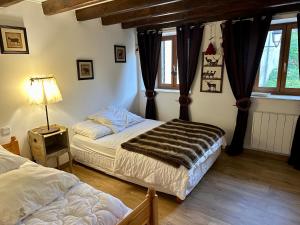 Posteľ alebo postele v izbe v ubytovaní Maison au coeur des Angles
