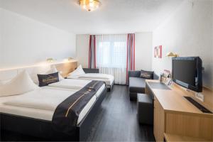 TV a/nebo společenská místnost v ubytování 4-Länder-Hotel Deutschmann