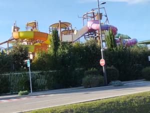 a water park with a roller coaster at Maison 5 personnes in Le Pontet
