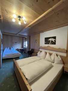 Postel nebo postele na pokoji v ubytování Haus am Sonnenhang