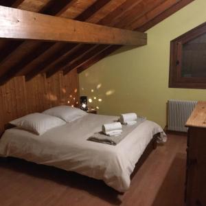 Ένα ή περισσότερα κρεβάτια σε δωμάτιο στο Comme à la maison