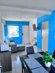 Μια τηλεόραση ή/και κέντρο ψυχαγωγίας στο Casa en Acapulco diamante WIFI, Clima, Alberca