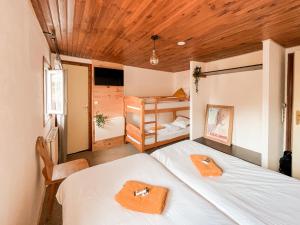 Ένα ή περισσότερα κρεβάτια σε δωμάτιο στο Hotel Le Pied Moutet