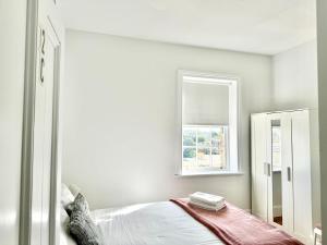 Voodi või voodid majutusasutuse Millers Point Waterview toas
