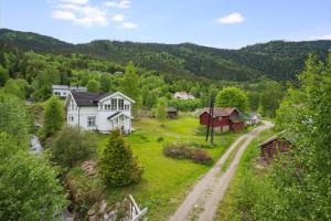 an aerial view of a house and a road at Hytte med fin natur in Mork