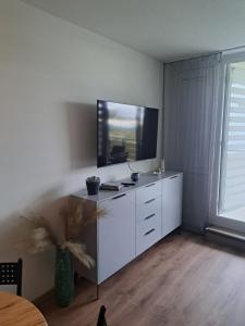 TV a/nebo společenská místnost v ubytování Sternenacht